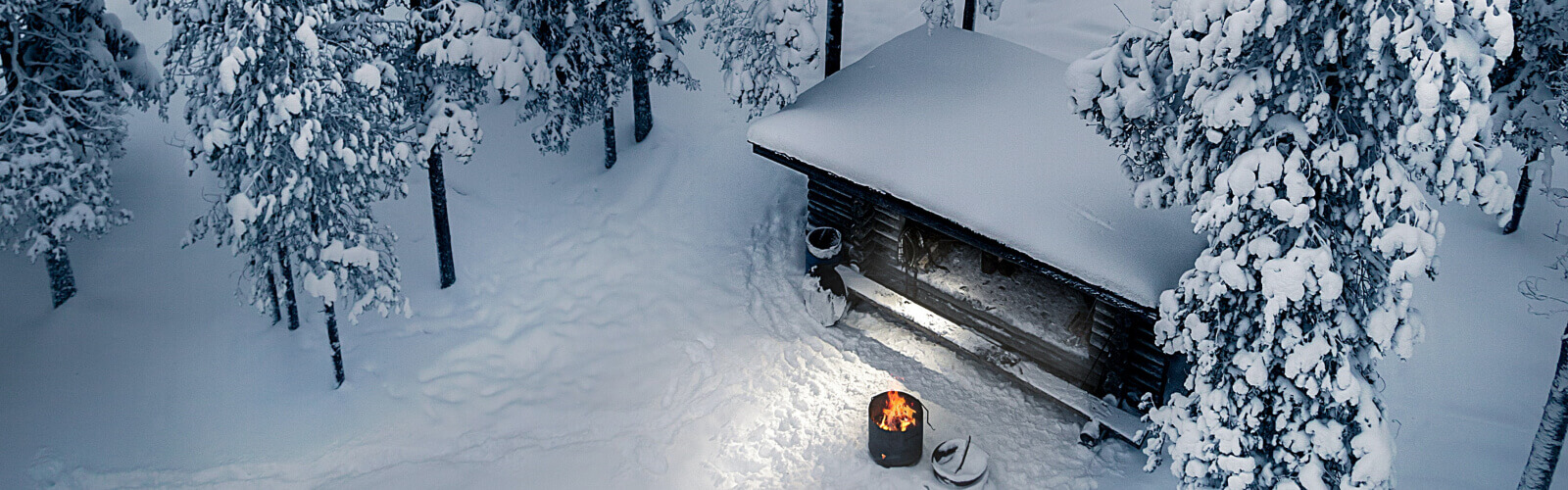 Cozy cabin with fire in a barrel behind freeze and unfreeze your credit heading